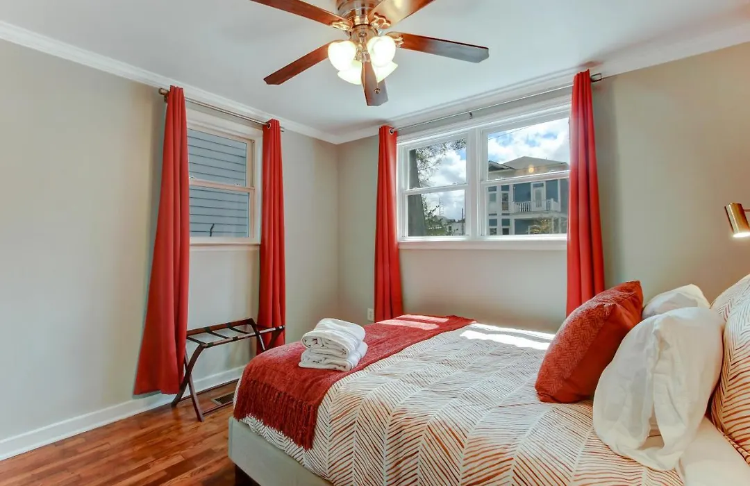 Vibrant, Colorful Condo Building With Backyard Firepit And Games-1